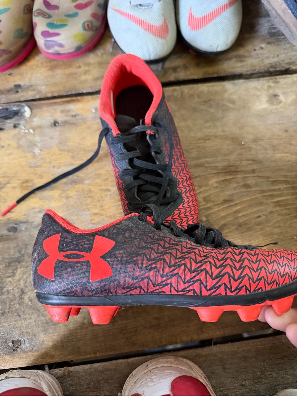 Under Armour Kids' Orange and Black Soccer Cleats